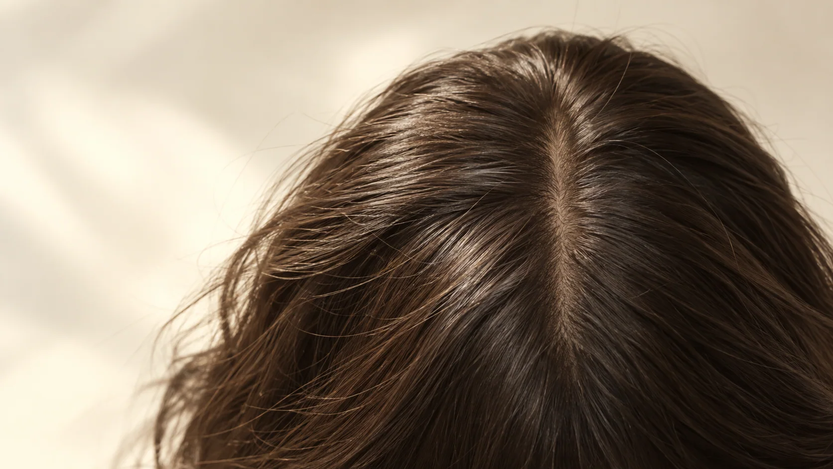 Natural scalp and dark hair part